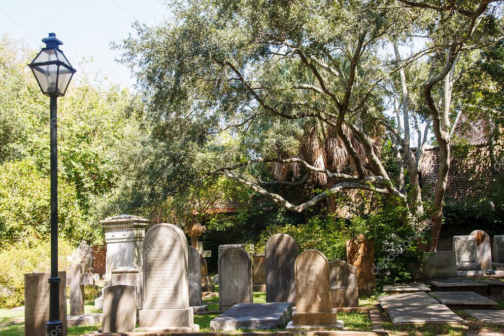 Tombstones And Lamp Post Under Spanish Moss Stock Photo Dbvirago A Lamp Post By Old Tombstones Under Spanish Moss In Charleston South Ina Photo Dbvirago