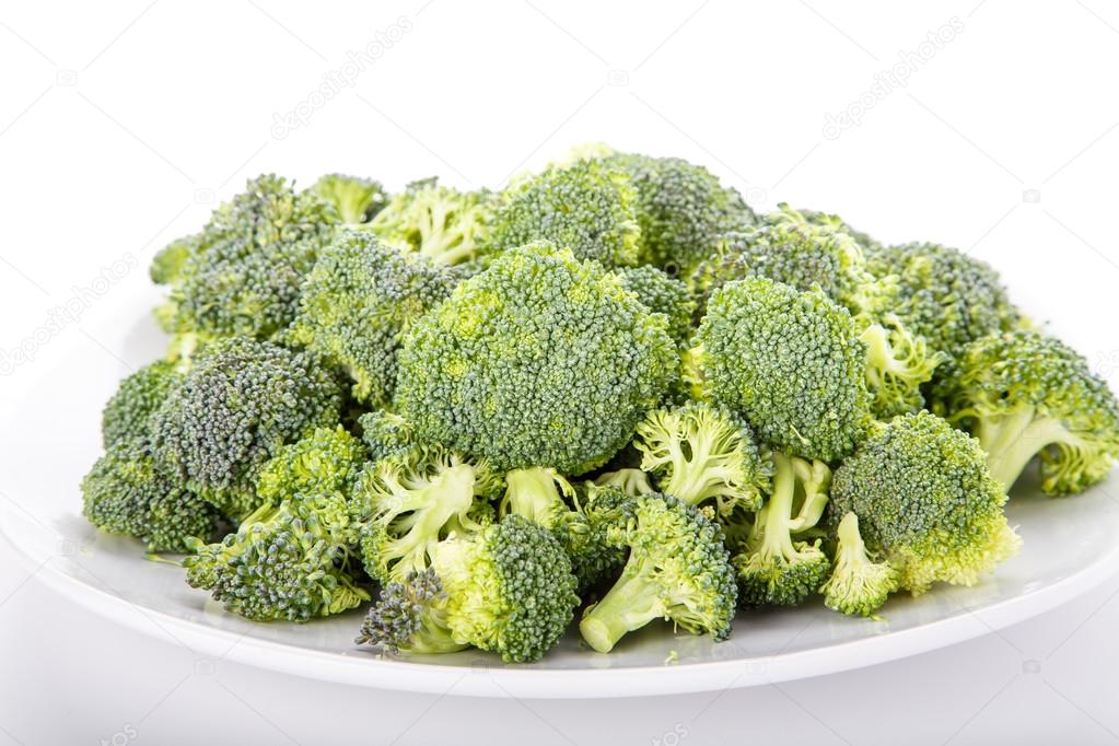 Broccoli Florets on a White Plate