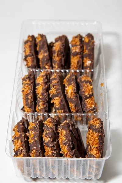 Chocolate and Coconut Cookies in Plastic Tray — Stock Photo, Image