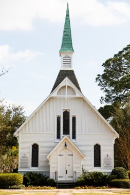 Small White Church with Green Steeple clipart