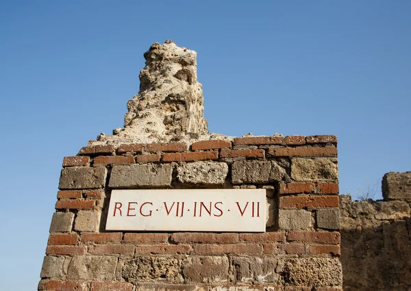 Latin Plaque on Ancient Brick Column — Stock Photo, Image