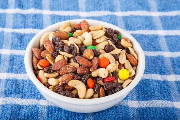 Trail Mix in Bowl on Blue Towel — Stock Photo, Image