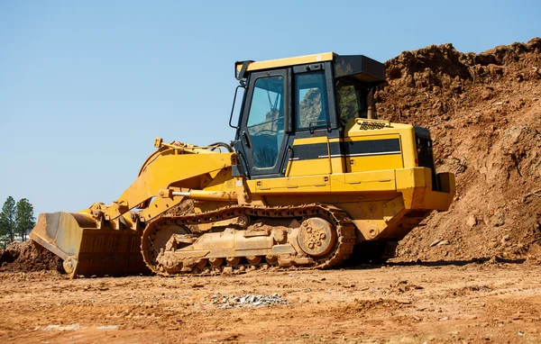 Yellow Earth Mover by Pile of Dirt — Stock Photo, Image