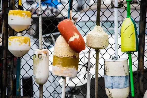 Colorful Lobster Buoys on Fence — Stock Photo, Image
