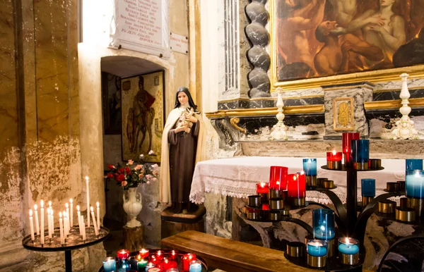 Candles with Madonna in Background — Stock Photo, Image