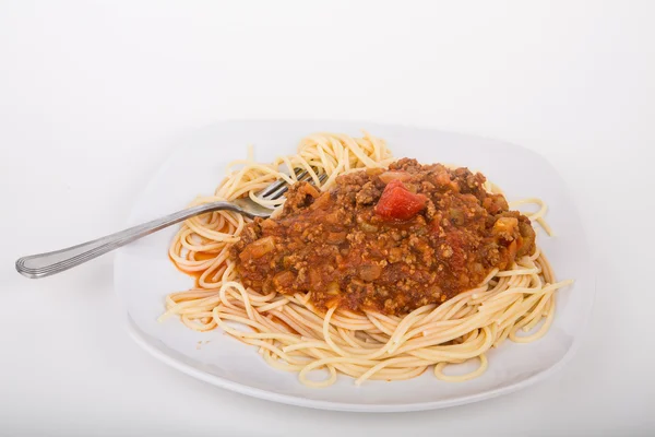 Spaghetti vred på gaffel med köttfärssås — Stockfoto