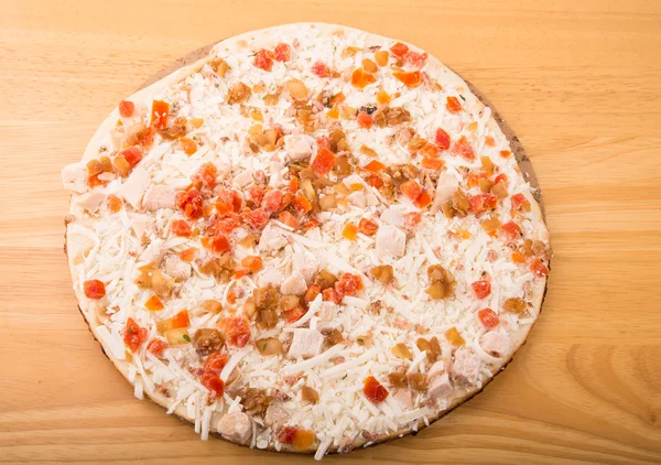 Frozen Margherita Pizza on Wood Board — Stock Photo, Image