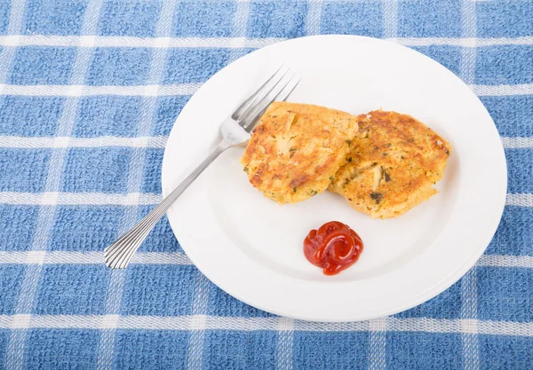 Two Crab Cakes on White Plate with Cocktail Sauce — Stock Photo, Image