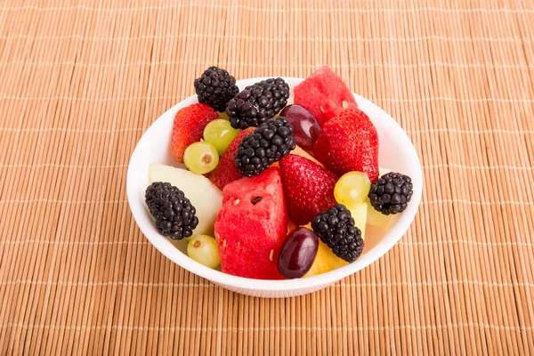 Berries Melons and Grapes in White Bowl — Stock Photo, Image