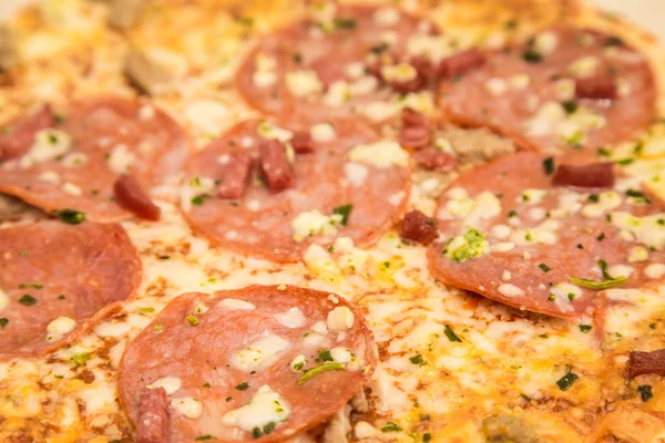 Closeup of Pepperoni on Hot Pizza — Stock Photo, Image