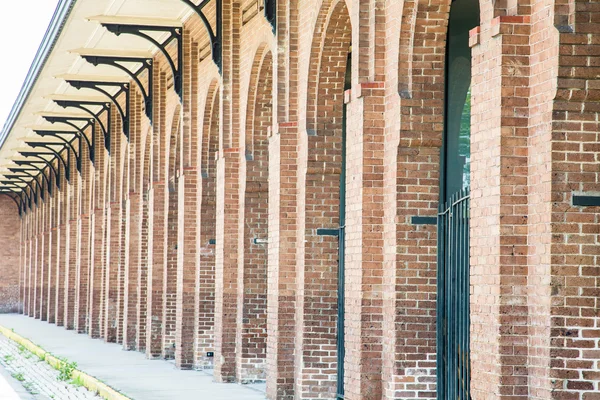 Rows of Arched Doors in a Brick Building — Stock Photo, Image