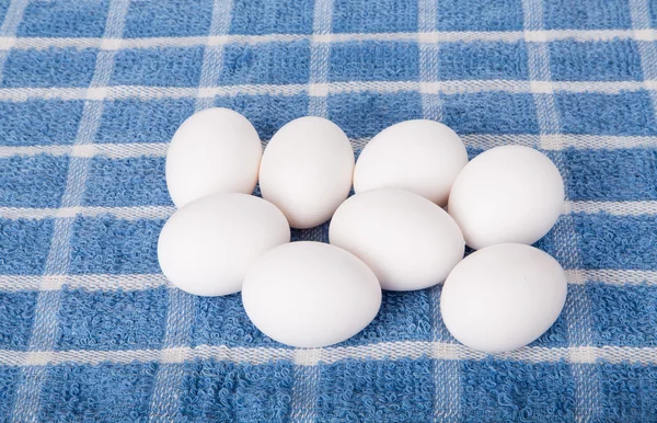 Fresh Eggs on Blue Towel — Stock Photo, Image