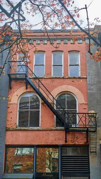 Fire Escape Old Painted Red Brick Building — Stock Photo, Image