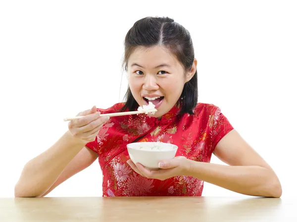 Asian woman eating rice — Stock Photo, Image