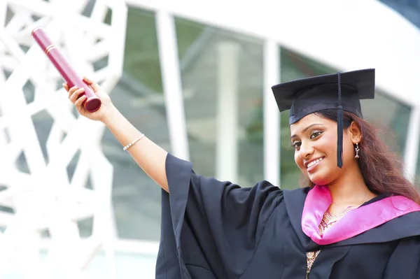 Indian in a graduation gown — Stock Photo, Image