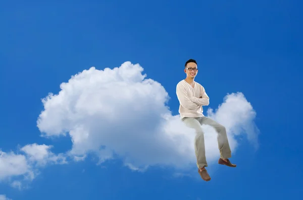 Aziatische man volledige lichaam zit wolk — Stockfoto