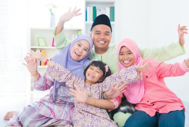 Excited Southeast Asian family clipart