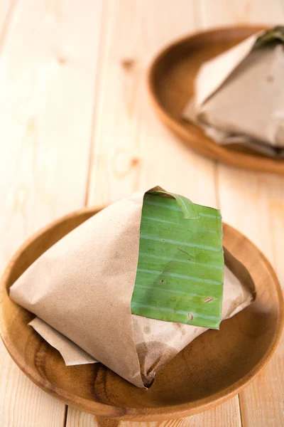 Nasi Lemak packed in banana leaf — Stock Photo, Image