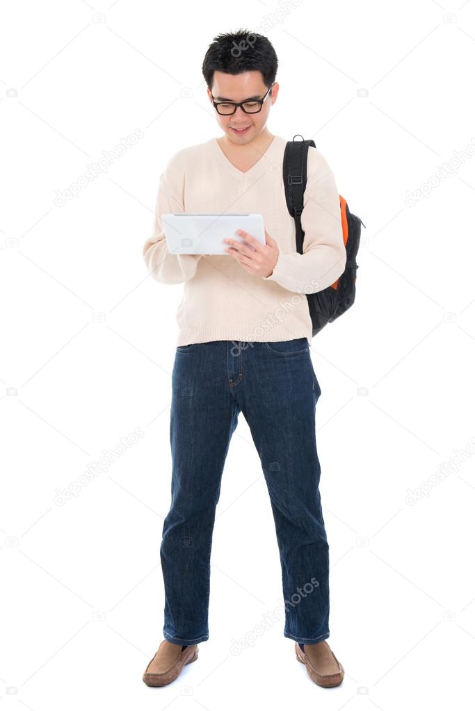Asian adult student using tablet pc