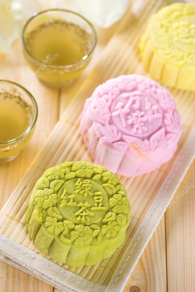 Snowy skin mooncakes. Traditional Chinese mid autumn festival food. The Chinese words on the mooncakes is green tea with red bean paste, noble delight and lotus paste, not a logo or trademark.