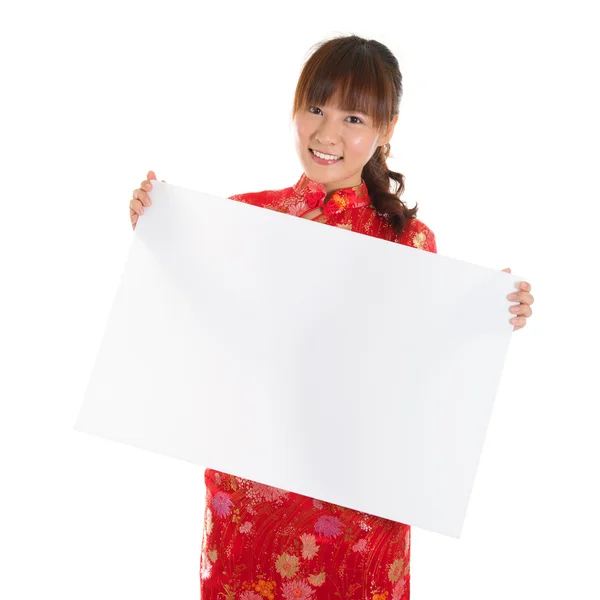Chinese cheongsam girl holding placard — Stock Photo, Image