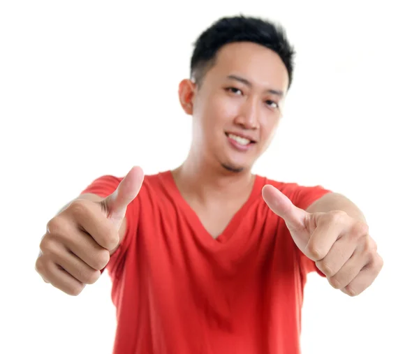 Thumb up cool young Southeast Asian man — Stock Photo, Image