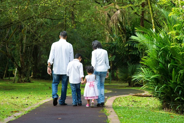 Happy Indian family walking outdoor — Stock Photo, Image