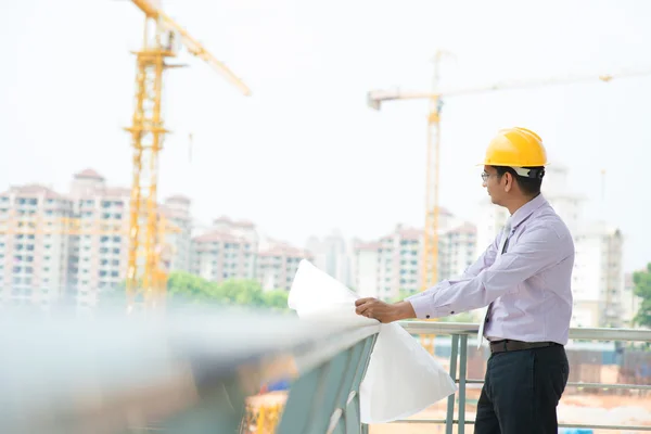 Asian Indian architect at construction site — Stock Photo, Image