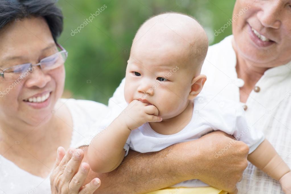 Asian grandparents and grandson
