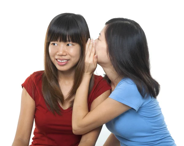 Whispering to ear — Stock Photo, Image