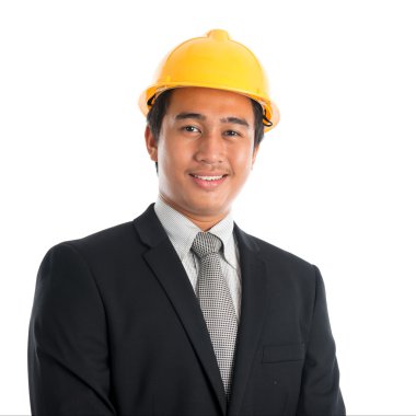 Asyalı adam giyen sarı kask.