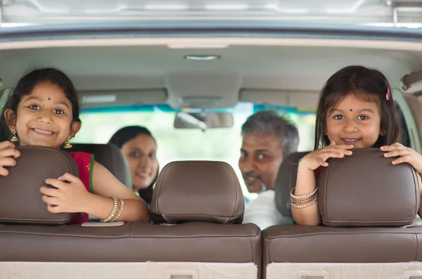 Indian family sitting in car — Stock Photo, Image