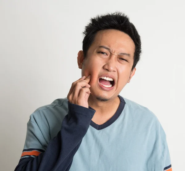 Ásia masculino dor de dente — Fotografia de Stock