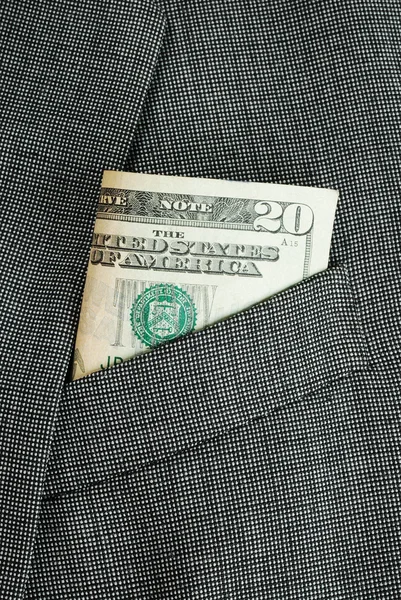 Money in a business suit pocket concepts of business finance