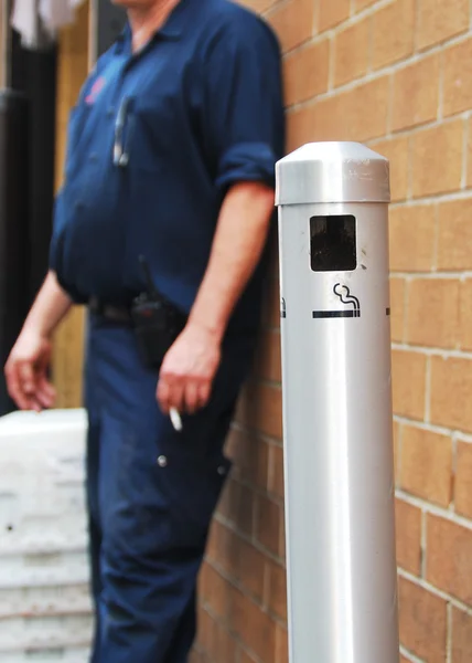 Smoking by the pole concepts of health issue — Stock Photo, Image