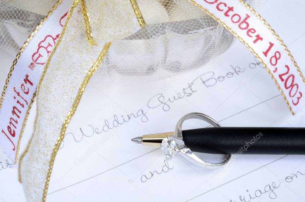 Sign the wedding guest book