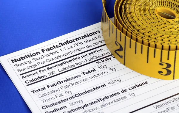 Fitas de medição sobre o conceito de Nutrição Fatos de refeições saudáveis — Fotografia de Stock