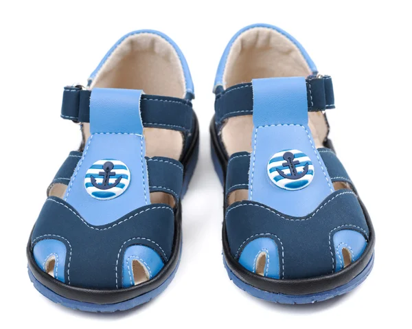 使用中的锚点形状图案宝贝蓝色凉鞋. — 图库照片