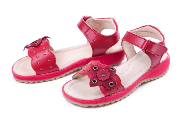 Rote Kindersandalen — Stockfoto