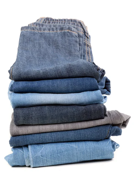 Stack of jeans isolated on white background — Stock Photo, Image