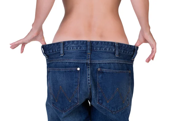 Ragazza magra in jeans grandi — Foto Stock