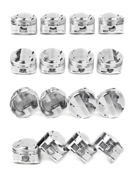 Collage d'un ensemble de quatre pistons forgés chrome poli — Photo