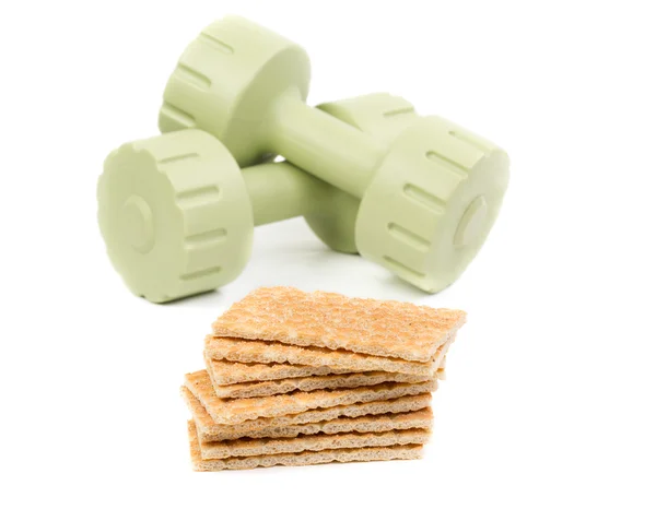 Dumbbells and bread — Stock Photo, Image