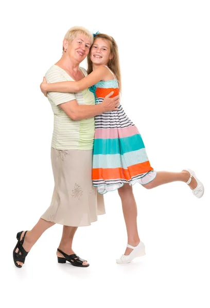 Grandmother with her granddaughter in the studio — Stock Photo, Image