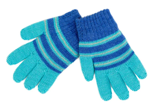 Par blå randiga stickade handskar — Stockfoto