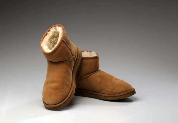 Pair of beige uggs with light fur — Stock Photo, Image