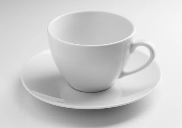 Empty ceramic cup and saucer — Stock Photo, Image
