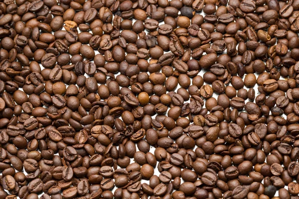 Background of delicious freshly roasted coffee beans. — Stock Photo, Image