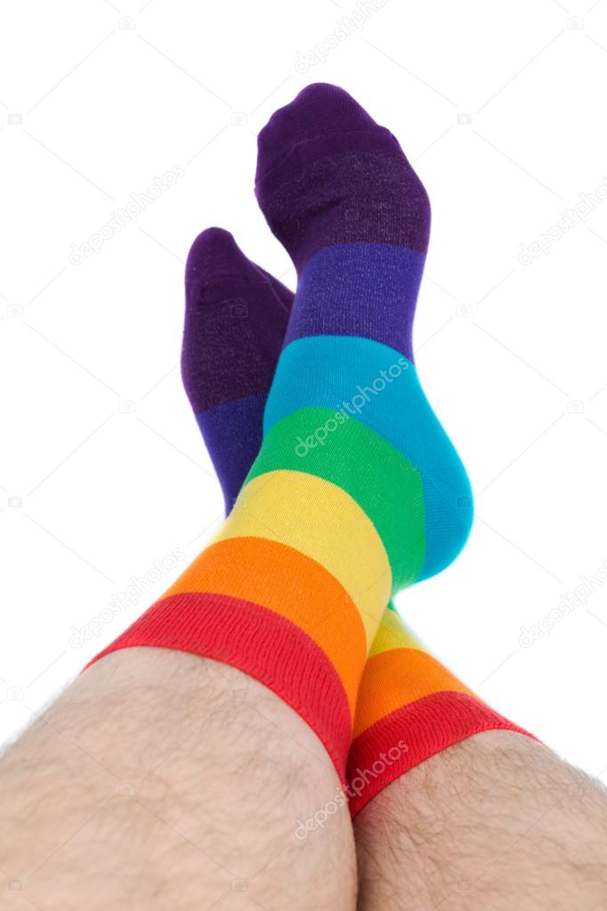 man legs in colorful funny socks - isolated