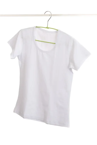 White t-shirt on hanger. — Stock Photo, Image